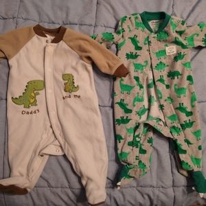 Two fleece footie dinosaur pajamas- size 0-3 mo